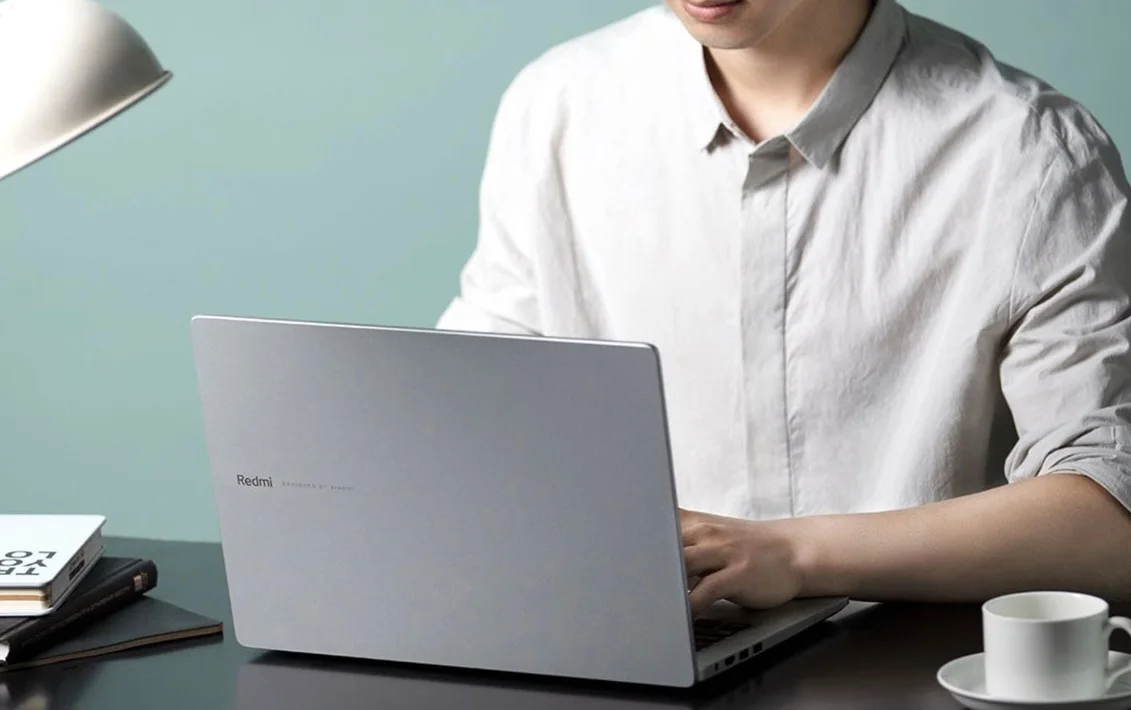 Куда уж дешевле: Xiaomi представила версию бюджетного ноутбука RedmiBook 14 на Core i3 - фото 1